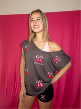 Load image into Gallery viewer, Off the shoulder t-shirt with cherry bow design