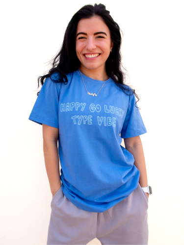 Blue graphic t-shirt with a whimsical 