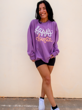 Load image into Gallery viewer, Young lady modeling a purple lightweight, crewneck sweatshirt with a hand-lettered script design saying "happy human" on the front in white and peach.