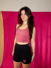 Load image into Gallery viewer, Pink cropped tank top with a built-in sports bra and bow design on the front