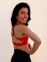 Load image into Gallery viewer, Red sports bra with a simple front, strappy back and light-medium support.