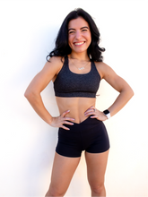 Load image into Gallery viewer, Heathered grey sports bra with medium support, removable pads and a criss cross back