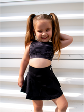 Load image into Gallery viewer, Stretchy, form fitting black tennis skort with built in side pocket.