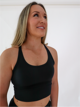 Load image into Gallery viewer, The black Peachy tank is a comfortable cropped tank top with a built in sports bra made for everyday wear.