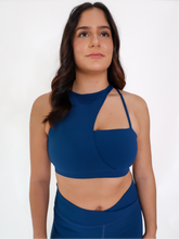 Load image into Gallery viewer, Blue Coffee Run Sports Bra provides a high neckline with ample support and comfort.