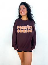 Load image into Gallery viewer, Brown oversized crewneck sweatshirt made of 80% cotton, 20% polyester, displaying a hand-drawn design for fall.