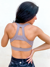 Load image into Gallery viewer, Grey sports bra has a slightly higher neck and thick strappy back to provide great comfort and high support.