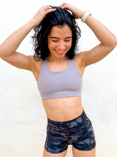 Load image into Gallery viewer, Grey sports bra has a slightly higher neck and thick strappy back to provide great comfort and high support.