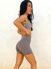 Load image into Gallery viewer, Young lady modeling comfortable, soft and stretchy grey biker shorts