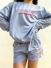 Load image into Gallery viewer, Grey crewneck sweatshirt with multicolor smiley face embroidered design.