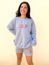 Load image into Gallery viewer, Grey, lightweight sweatshorts with multicolored smiley faces embroidered.