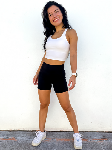 The white Peachy tank is a comfortable cropped tank top with a built in sports bra made for everyday wear.