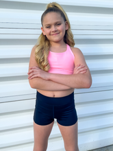 Load image into Gallery viewer, The Youth Peachy Shorts are high-waisted in color black with a 75% nylon, 25% spandex blend. Extra stretchy fabric provides extra comfort while still providing a more fitted appearance.