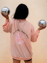 Load image into Gallery viewer, peach crewneck sweatshirt with 3 records that have music notes surrounding them printed on the front, and a colorful disco ball with the phrase &quot;do a little happy dance&quot; printed on the back
