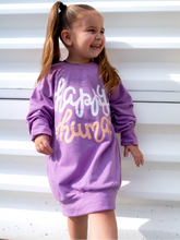 Load image into Gallery viewer, Young girl modeling a purple lightweight, crewneck sweatshirt with a hand-lettered script design saying &quot;happy human&quot; on the front in white and peach.
