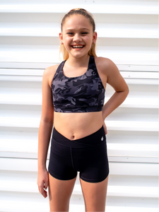 Form fitting, high waisted, black spandex shorts with a criss cross waistband.