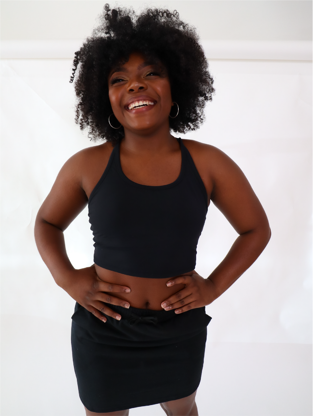 The black Peachy tank is a comfortable cropped tank top with a built in sports bra made for everyday wear.