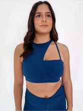 Load image into Gallery viewer, Blue Coffee Run Sports Bra provides a high neckline with ample support and comfort.
