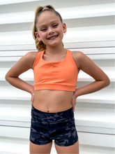 Load image into Gallery viewer, Kids peach sports bra with simple front and cute criss cross back
