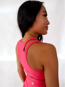 Pink Split Sports Bra has a standard racerback style with a slit on the upper right shoulder area. High support.