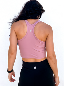 The purple Peachy tank is a comfortable cropped tank top with a built in sports bra made for everyday wear.
