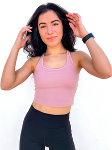 The purple Peachy tank is a comfortable cropped tank top with a built in sports bra made for everyday wear.