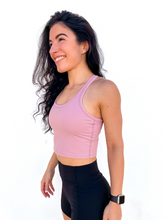 Load image into Gallery viewer, The purple Peachy tank is a comfortable cropped tank top with a built in sports bra made for everyday wear.
