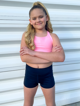 Load image into Gallery viewer, The Youth Peachy Shorts are high-waisted in color black with a 75% nylon, 25% spandex blend. Extra stretchy fabric provides extra comfort while still providing a more fitted appearance.
