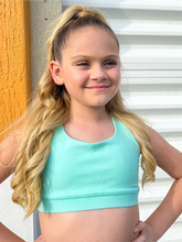 Load image into Gallery viewer, Kids tiffany blue sports bra with simple front and cute criss cross back
